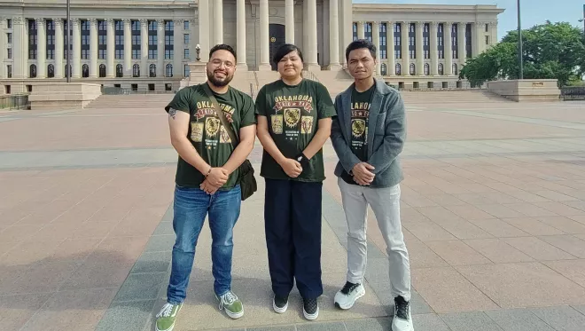 Sergio Perez, Jennifer Roblada, and Zam Tuang pose for a photo