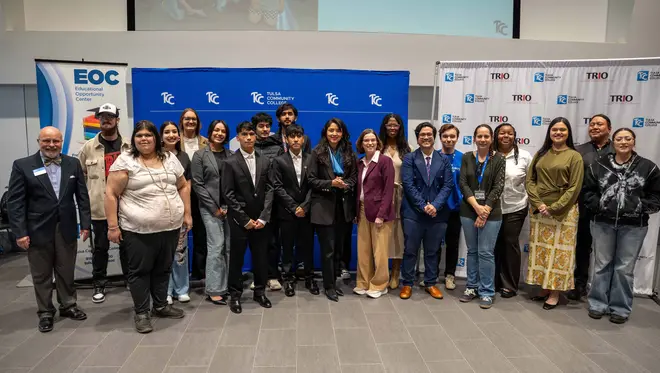 About a dozen TRIO students and staff pose for a photo with TCC President Leigh Goodson and Tulsa Deputy Mayor Krystal Reyes.