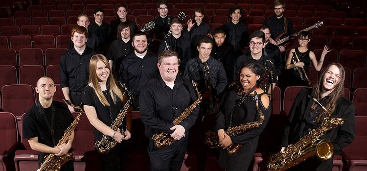 TCC Fine Arts Band Students pose with their instruments at the Vantrease PACE.